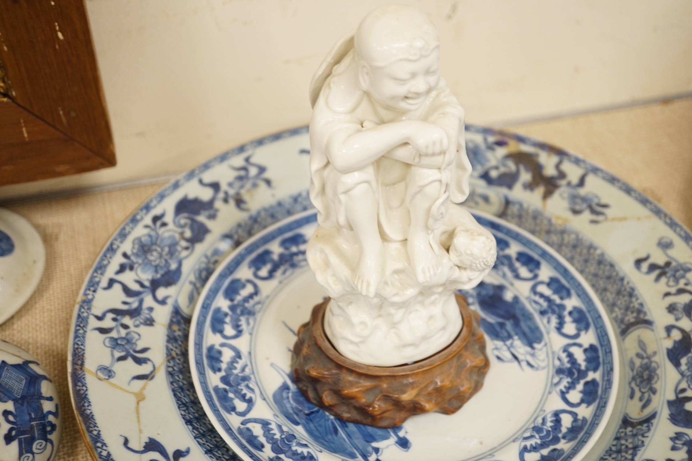 A large collection of Chinese blue and white export plates, a blanc de chine figure, two vases, a jar and five Japanese planters, jar 24cm high (a.f.)